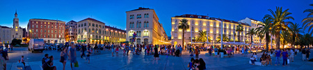 Split, Croatia - August 25 2014: City of Split square evening panorama, Dalmatia, Croatia. Many tourists visit famous new Riva waterfront. It is a part of Diocletian palace, UNESCO world heritage site.の写真素材