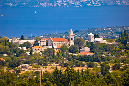 Village of Skrip stone architecture and Brac channel view, Dalmatia, Croatiaの写真素材