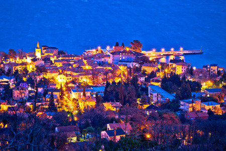 Town of Lovran seafront aerial evening view, Opatija riviera of Croatiaの写真素材