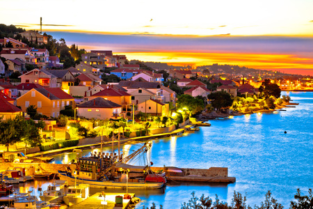 Golden sunset on Ugljan island coast, Kali and Preko villages, Dalmatia, Croatiaの写真素材
