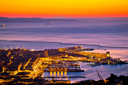 Aerial evening view of Trieste city center and waterfront , capital city of Friuli-Venezia Giulia region in Italyの写真素材