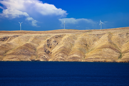 Stone desert island of Pag wind power plants view, archipelago of Croatiaの写真素材