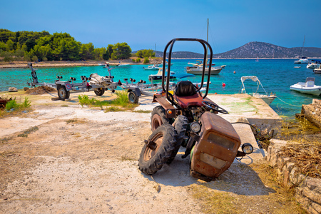 Crushed tractor by the sea on island Prvic, Dalmatia region of Croatiaの写真素材