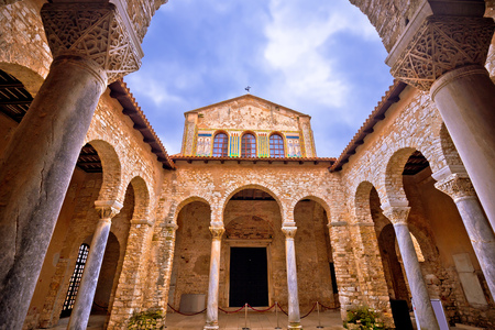 Euphrasian Basilica in Porec arcades and tower view, UNESCO world heritage site in Istria, Croatiaの写真素材