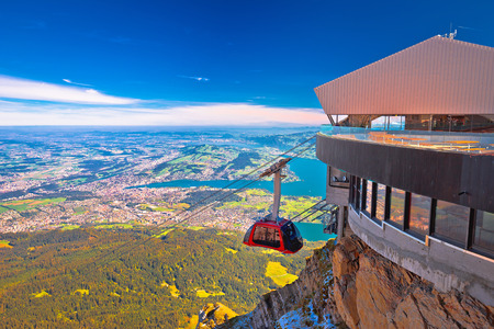 Mount Pilatus aerial cabelway above cliffs and Lake Lucerne landscape, Switzerlandのeditorial素材