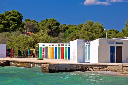 Jadrija beach and colorful cabins view, tourist destination in Sibenik archipelago of Croatiaの写真素材
