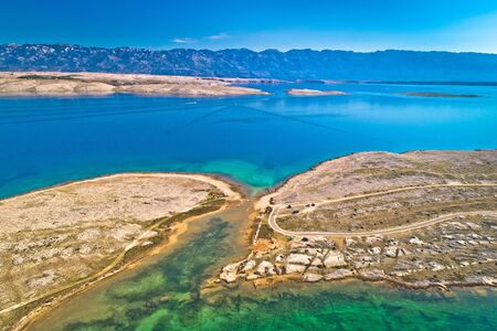 Zecevo passage. Stone desert island of Zecevo and Velebit mountain aerial view, Zadar archipelago of...