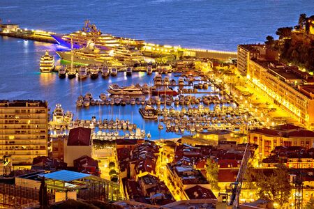 Monte Carlo yachting harbor and colorful waterfront golden dawn view, Principality of Monacoの写真素材