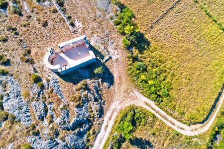Saint Lovre church ruin in Vrsi aerial view, stone desert of Zadar archipelago of Croatiaの写真素材