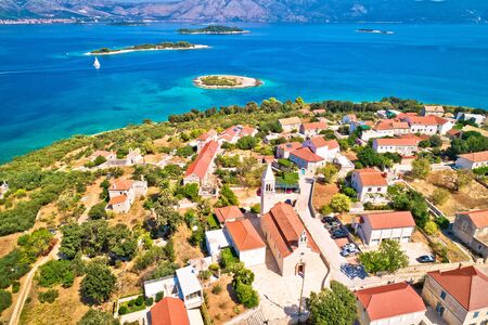 Lumbarda. Korcula island vllage of Lumbarda church and coastline aerial view, southern Dalmatia, Croatiaの写真素材