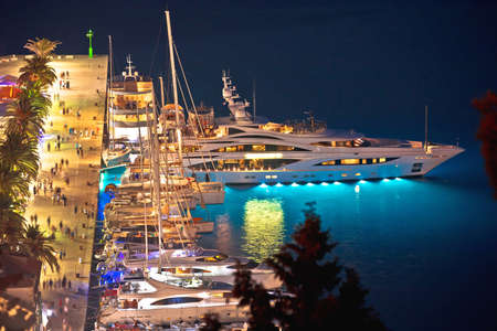 Hvar bay and yachting harbor aerial panoramic evening view, island in Dalmatia archipelago of Croatiaのeditorial素材