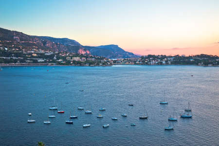 Villefranche sur Mer idyllic French riviera bay and Cap Ferrat sunrise view, Alpes-Maritimes region of Franceの写真素材