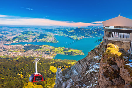 Mount Pilatus aerial cabelway above and town of Luzern aerial view, central Switzerland landscapeのeditorial素材