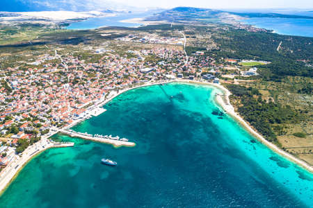 Novalja, Pag island. Idyllic beach and turquoise sea aerial view in town of Novalja, Adriatic...