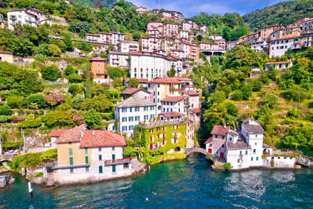 Town of Nesso on steep cliffs and creek waterfall on Como Lake aerial waterfront view, Lombardy region of Italyのeditorial素材