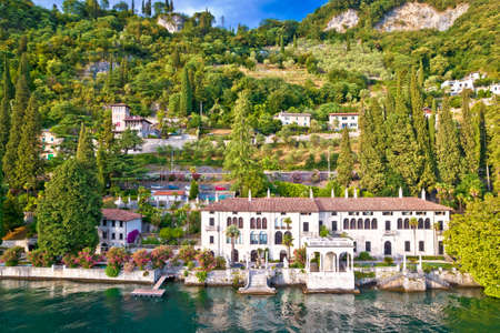 Como Lake and town of Varenna waterfront villas aerial view, Lombardy region of Italyのeditorial素材