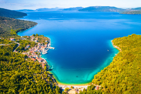 Bay and village of Valun on Cres island aerial view, idyllic beach and nautical destination on...