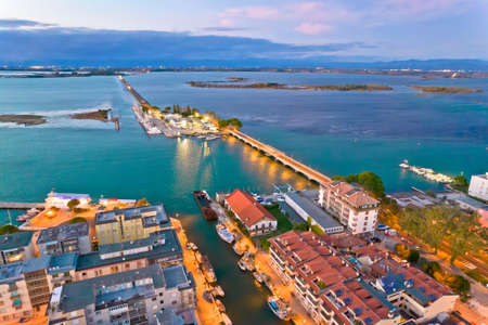 Town of Grado archipelago and bridge to mainland aerial evening view, Friuli-Venezia Giulia region of Italyのeditorial素材