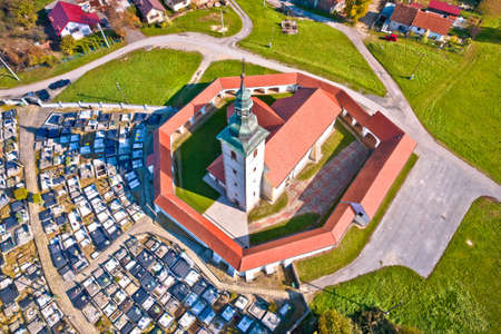 Village of Komin church aerial view, Prigorje region of Croatiaの写真素材
