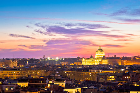 Vatican sunset. Colorful dusk view of Rome and Vatican rooftops and landmarks, eternal city and capital of Italy. Holy See.のeditorial素材