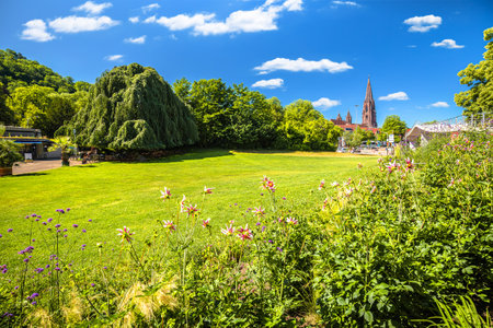 Freiburg im Breisgau cathedral and green landscape view, Baden Wurttemberg region of Germanyのeditorial素材