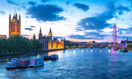 Bigh Ben and Thames riverfront sundown panoramic view in London, capital of United Kingdomのeditorial素材