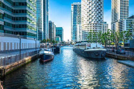 Canary Wharf financial district of London skyscrapers and canal view, capital of United Kingdom