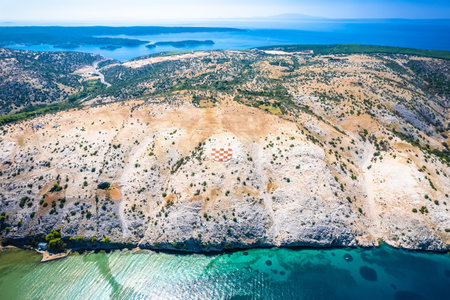 Rab island gigantic amblem of Croatia in stone desert near Lopar aerial view, archipelago of Croatiaの写真素材