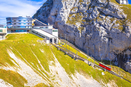 Mount Pilatus peak descent on worlds steepest cogwheel railway, 48 percent, tourist landscape of Switzerlandのeditorial素材