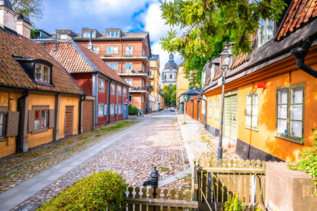 Colorful architecture of Stockholm old city center upper town, Saint Katarina Parish church, capital...