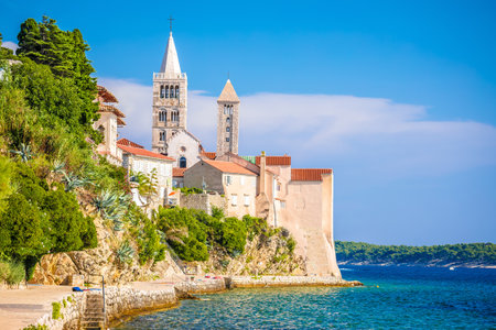 Historic town of Rab towers and beach walkway view, archipelago of Croatia, Dalmatiaの写真素材