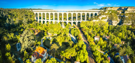 Roquefavour stone Aqueduct in green landscape panoramic aerial view, landmark of southern Franceの写真素材