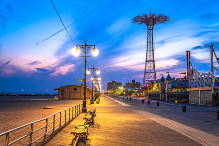 Coney island boardwalk and fun park evening view, New York city beach, USAの写真素材