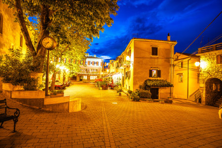 Hill town of Dobrinj on Krk island evening street view, Kvarner region of Croatiaの写真素材