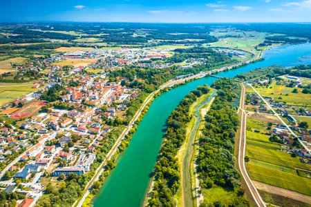 Town of Ormoz and Drava river border between Slovenia and Croatia aerial view, eastern Europeの写真素材