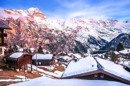 Idyllic Alpine village of Murren and winter Alps under snow view, Berner Oberland region of Switzerlandの写真素材