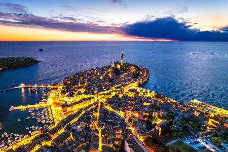 Town of Rovinj historic peninula aerial dusk view, Istria region of Croatiaの写真素材