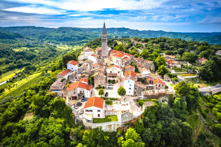 Pican, Istria. Historic stone village of Pican on green hills of Istria aerial view. Landscape of Croatiaの写真素材