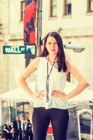American Woman with long black hair traveling in New York in hot summer, wearing white collarless...