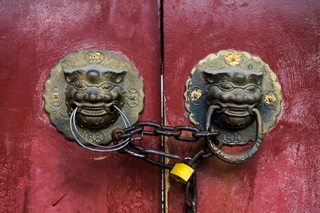 ancient chinese wooden door with lock on it