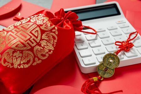 Calculator with chinese wedding candy bagの写真素材