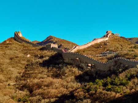Majestic Great Wall of China over blue sky and white cloudsの写真素材