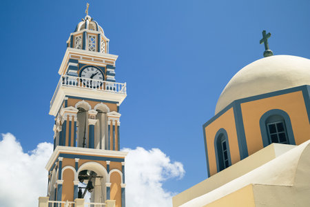 Clock Tower - St John the Baptist Cathedral in Fira, Greeceの写真素材