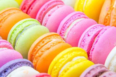 Colorful macaroon on white background, sweet and cakes.の写真素材