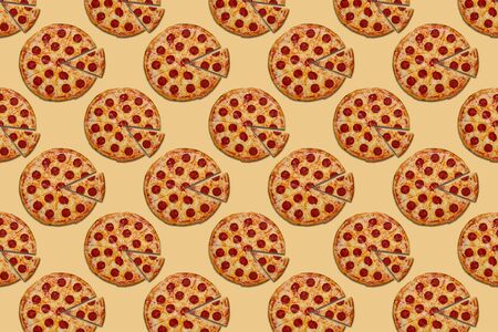pepperoni pizza on a beige background Beautiful trendy pattern concept backgroundの写真素材