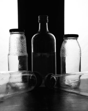 composition of glass bottles on a light background. High quality photoの写真素材
