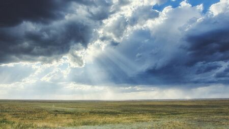 clouds in the sky before a thunderstorm with sunbeams Very high quality photoの写真素材