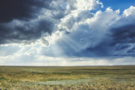 clouds in the sky before a thunderstorm with sunbeams Very high quality photoの写真素材