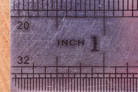 Iron line. Scale of inch. Close-up. Macro effect photo. High quality photo