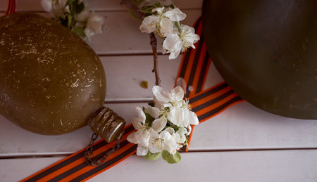 Black orange St. George ribbons on a wooden background. high quality photoの写真素材